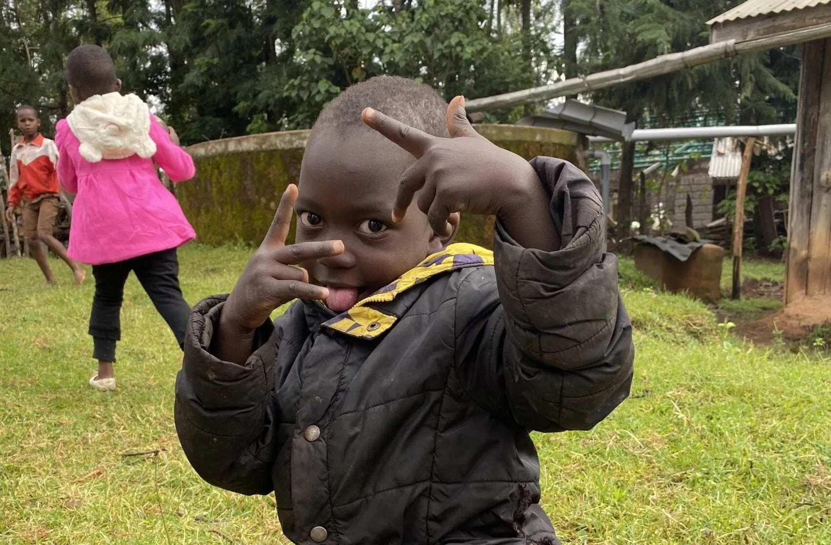 A child holding a flower