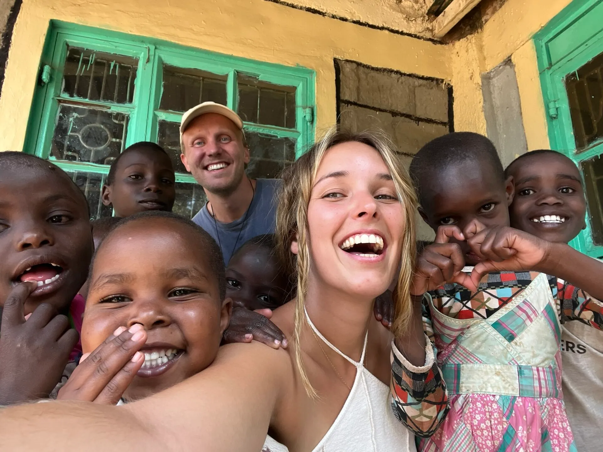 Volunteers with children at Umoja Children's Home